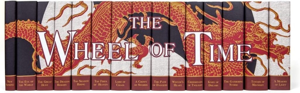 Complete Wheel of Time book series set showing all 14 main books plus New Spring prequel, Juniper Books special edition with golden dragon design spines