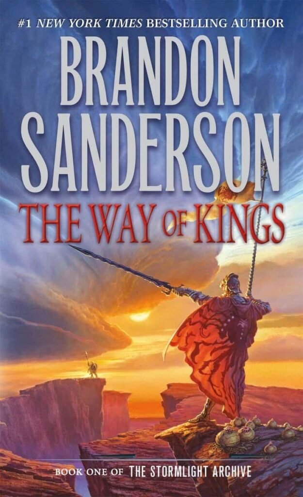 Finished Mistborn? What to Read Now: Choosing The Best Cosmere Path 2 Epic fantasy book cover of Brandon Sanderson's "The Way of Kings" with a heroic warrior on a dramatic sunset landscape.